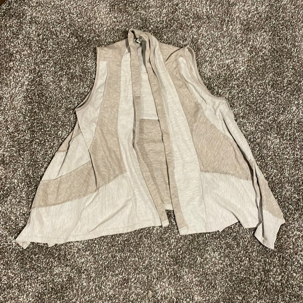 Light tan vest.
